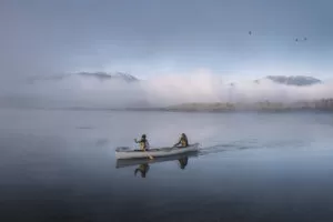 Paddling through the morning fog in the Columbia River Wetlands in Invermere