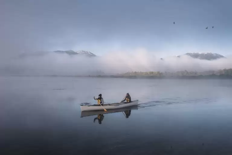 Paddling through the morning fog in the Columbia River Wetlands in Invermere