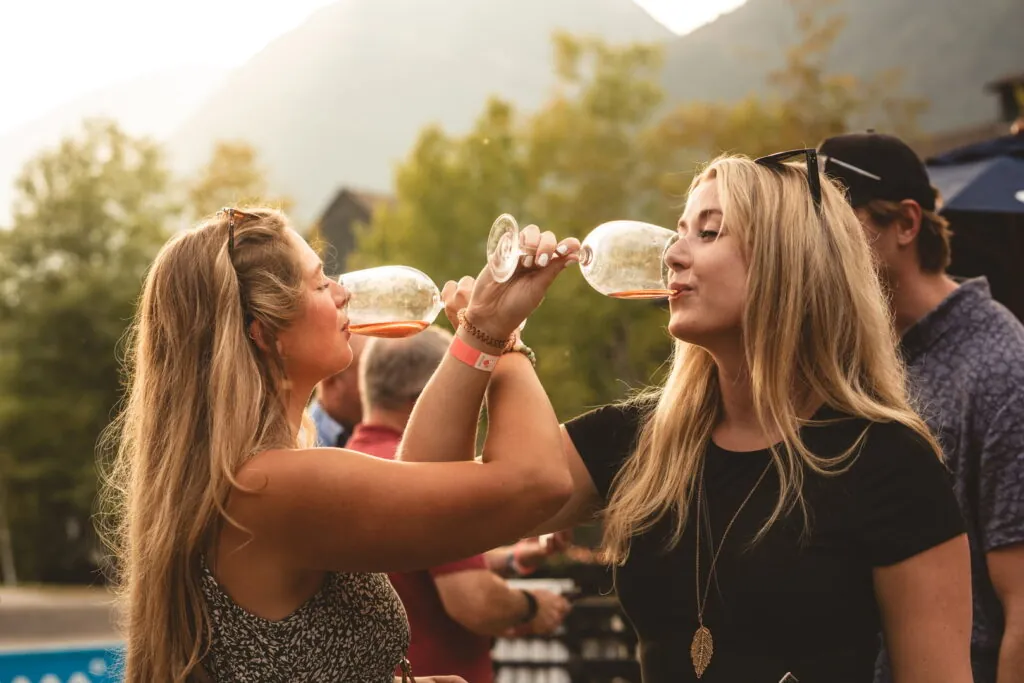 Girls drinking wine at The Harvest Panorama Mountain Resort